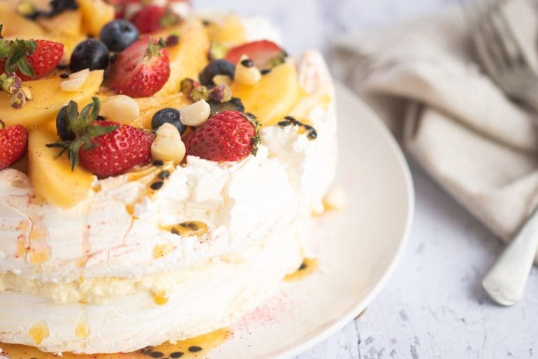 Nuts for Life - Macadamia nut pavlova with mango and passionfruit