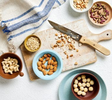 Nuts for Life - Mixed nuts on chopping board